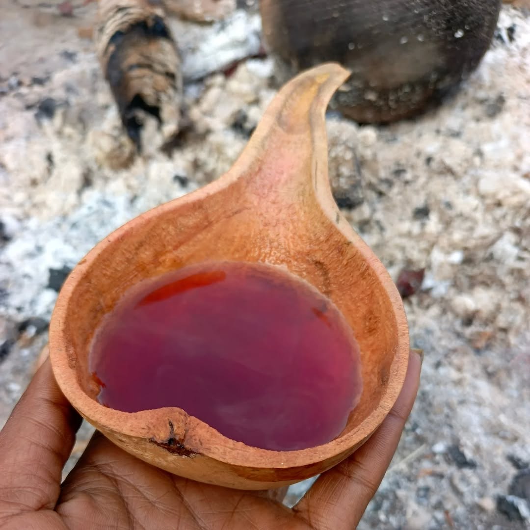 Traditional Herbal Brew – Served in Hand-Carved Gourd Bowl.