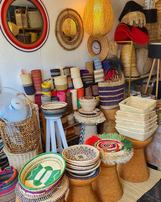 Artisan Display of Baskets, Trays & Spiral Stools - Circle of Texture & Tradition – Enkito e Emayian (Step of Celebration).