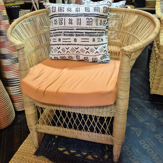 Wicker Armchair with Tribal Pillow - Circle of Rest & Pattern – Enkito e Naramat (Step of Stillness).