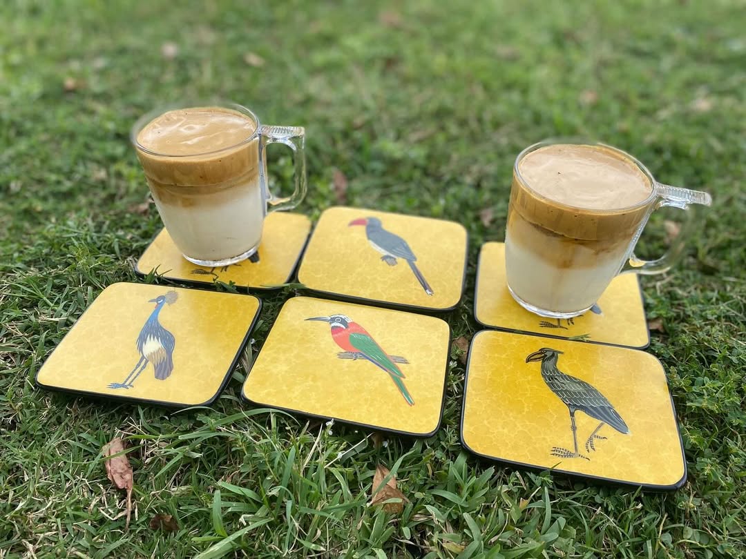 Maasai Feather Pause – 'Enkátá Emut' (Adornment & Echo) – Bird Coaster & Coffee Ritual Ensemble.