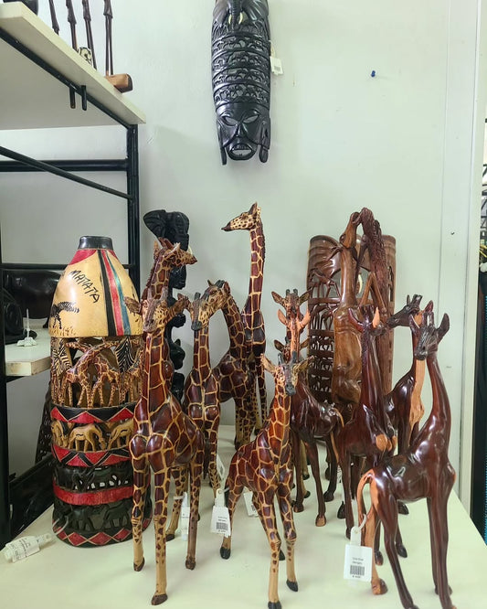 Namibian Sculpture & Vessel Ensemble - Maasai Vault of Standing Echo – 'Enkátá Olng’ejang’' (Guardian & Bloom).