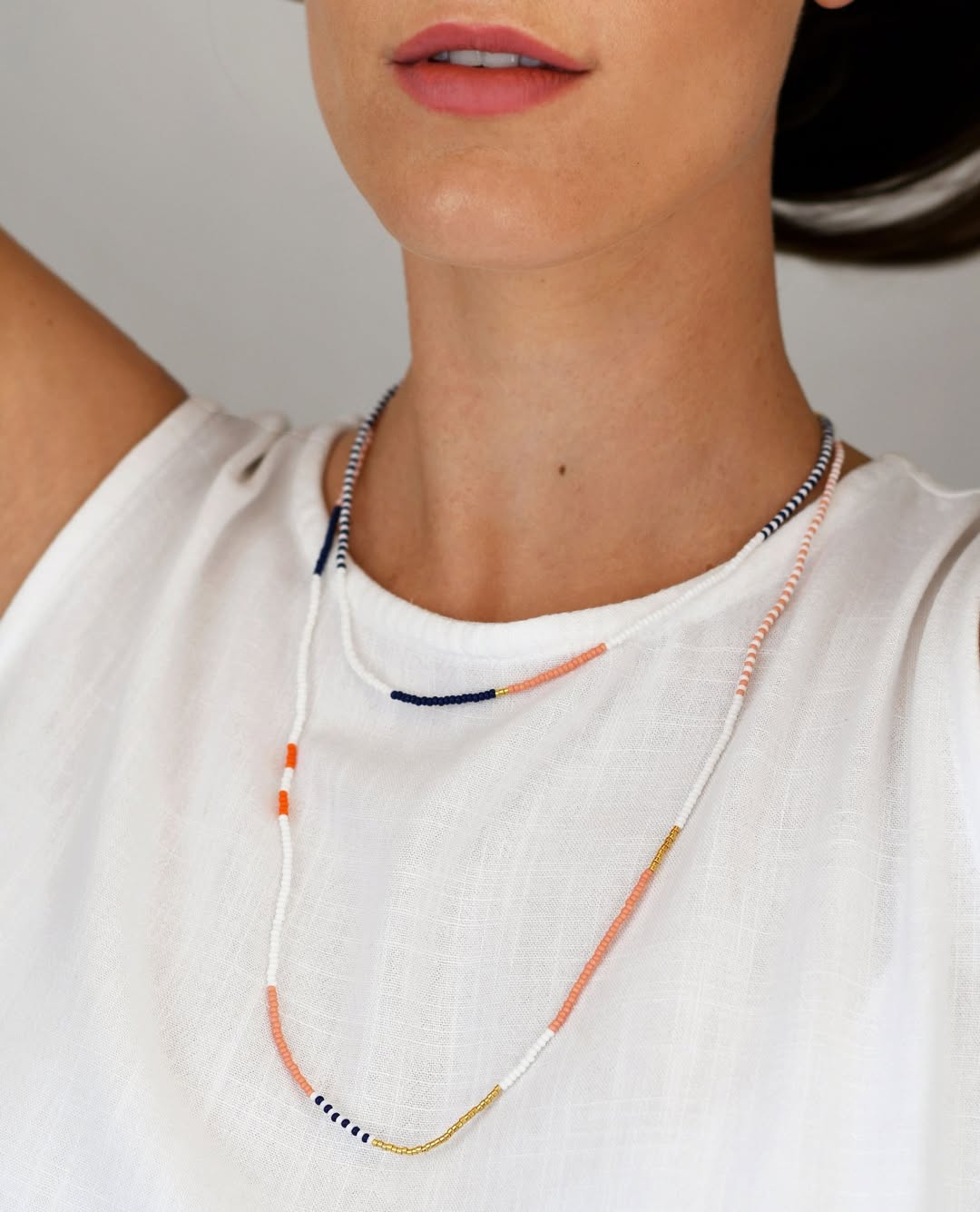 Segmented Strand Lariat / Necklace in Coral, Indigo, and Ivory - Map of Connection & Flow – Enkito e Olomunyak (Step of Blessing).