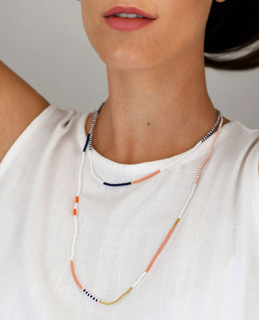 Segmented Strand Lariat / Necklace in Coral, Indigo, and Ivory - Map of Connection & Flow – Enkito e Olomunyak (Step of Blessing).
