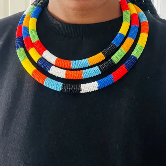 Triple-Strand Beaded Necklace – Enkare e Sidai le Olkaria (Beautiful River of the Hearth) Edition.