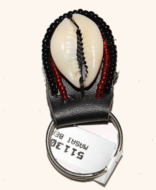 Cowrie Beaded Keychain – Olng’ejuk le Olkaria (Vessel of the Hearth) – Shell Spirit Edition.