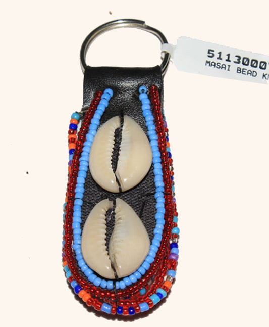 Cowrie Beaded Leather Keychain – Olng’ejuk le Olkaria (Vessel of the Hearth) – Guardian Spirit Edition.