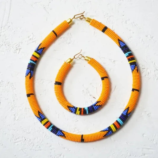 Handmade Maasai Beaded Jewelry Set – Orange Geometric Necklace and Bracelet – Olng’ejuk le Sidai (Adornment of Beauty).